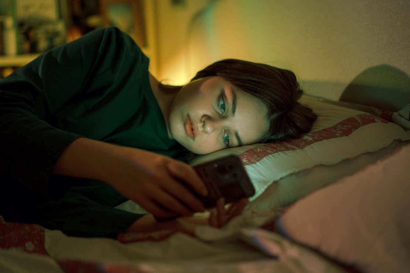 Portrait of a teenage girl talking with mobile phone. Concept of depression, loneliness, problems of adolescence. Selective focus