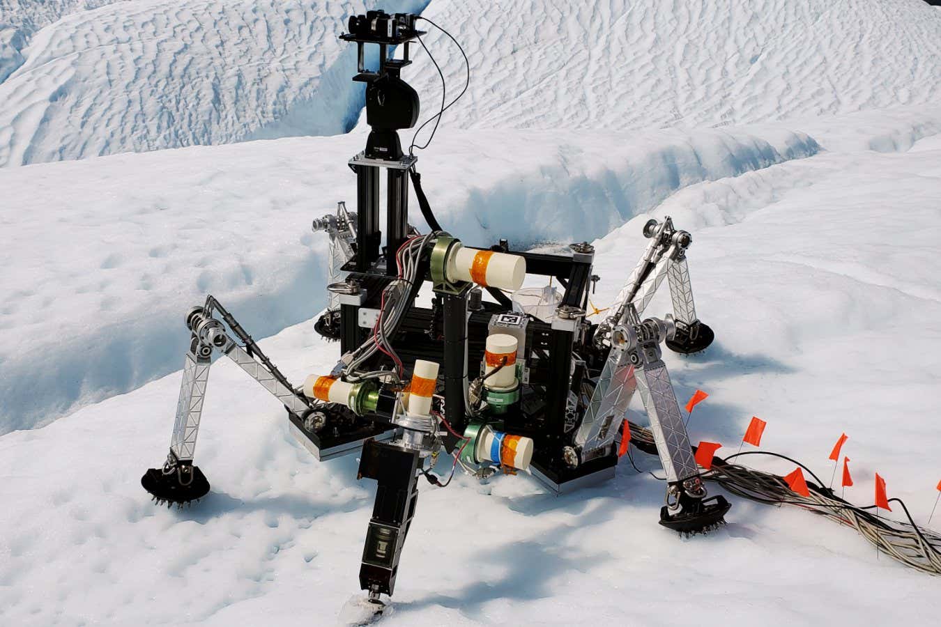 Caption The ICEPIC sampling tool drilling into the ice at sampling site A of the Matanuska Glacier, AK, field trial. Credit NASA/JPL-Caltech
